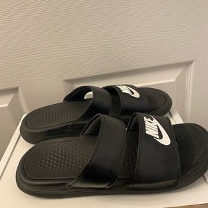 Black Nike slides